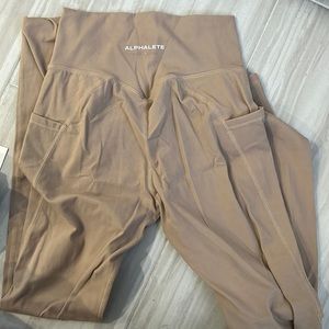 Alphalete leggings with side pockets